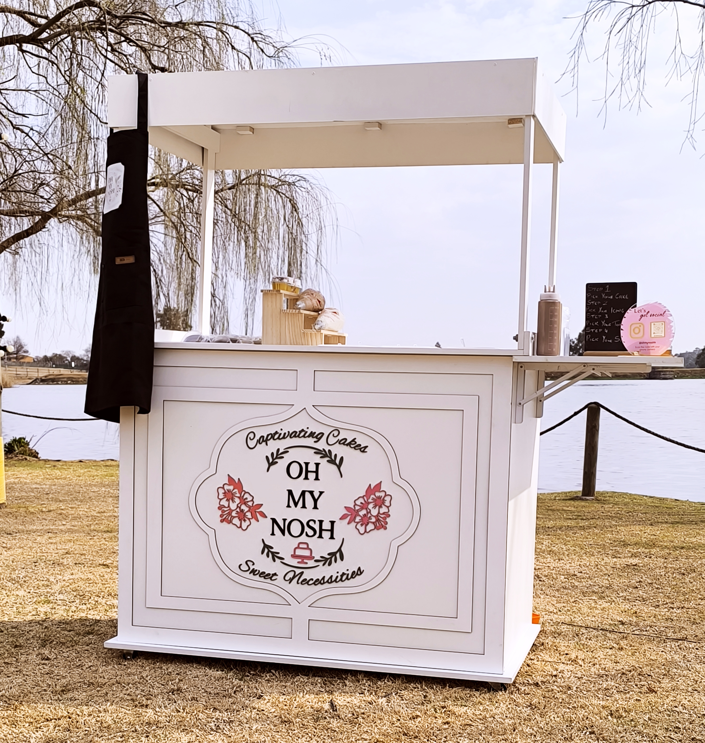 Elegant white cake cart view 1